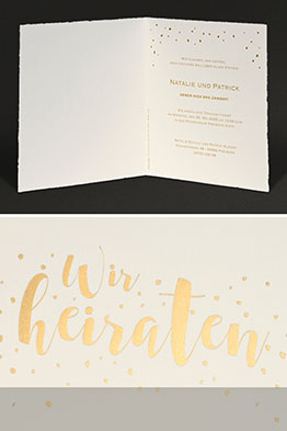 Darstellung der aufgeklappten Einladungskarten.