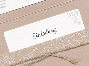 Vergrößerte Abbildung Detailaufnahme des Blumenmusters und der Natur-Kordel.